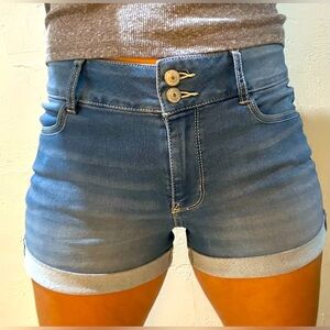 SOLD Women’s Mid Rise Medium Wash Denim Shorts